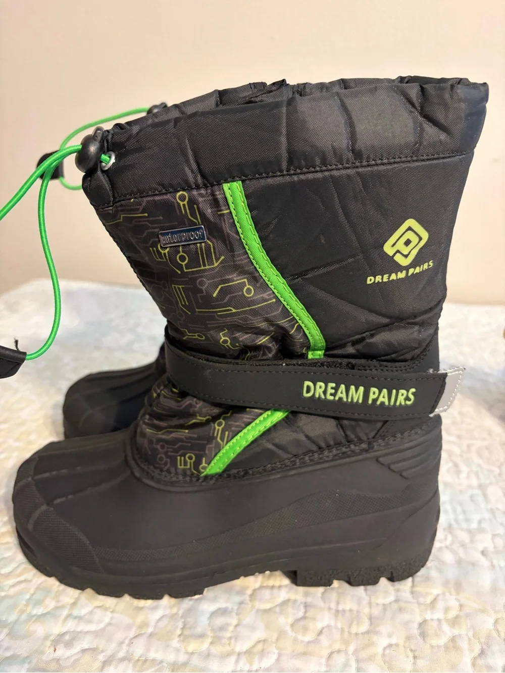 Dream Pairs Black Snow Boots with Neon Green Tech Style Accents